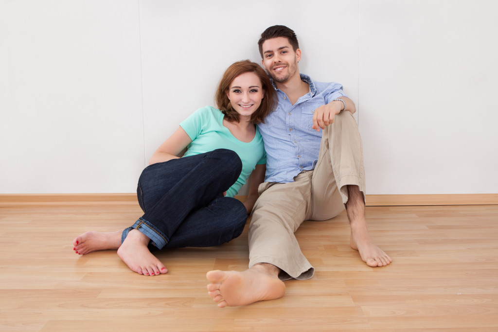 couple sitting on the floor