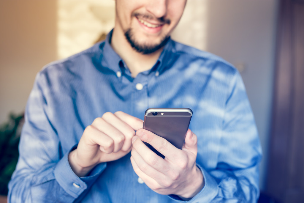 man using his phone