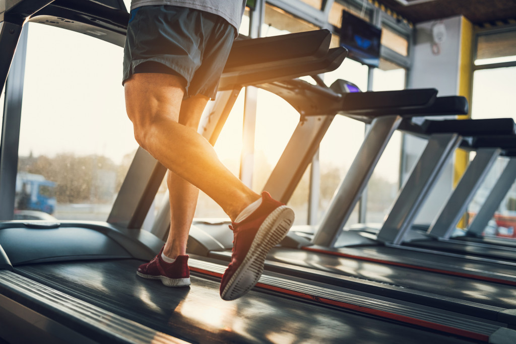 man using treadmill