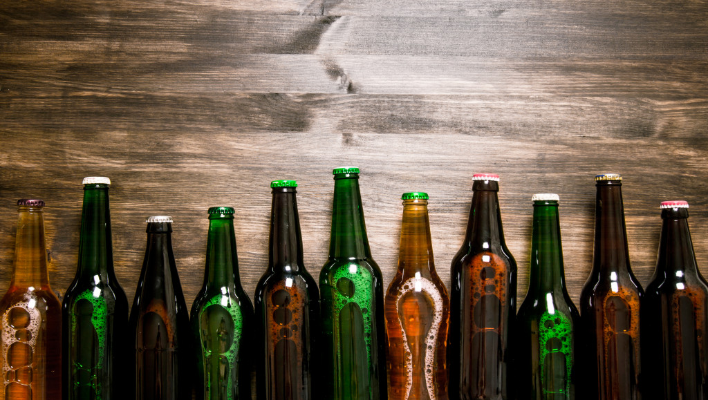 beer bottles on wooden table