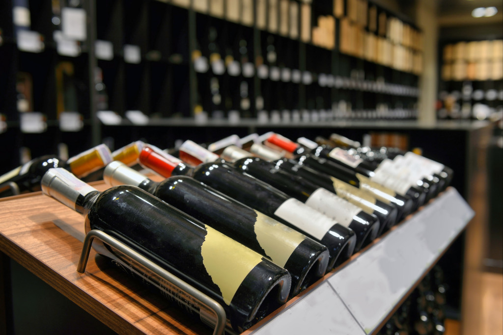 wine bottles in wine shop organized 