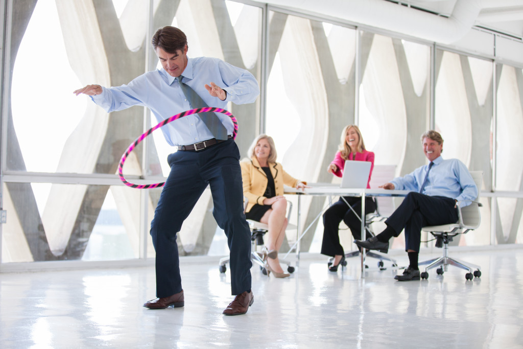 man doing the hula hoop