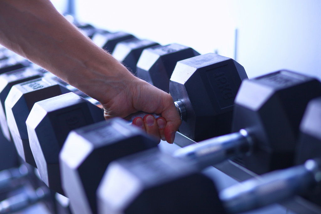 sports dumbells in line